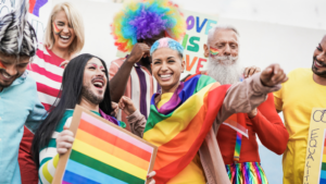 Group of people celebrating at pride parade