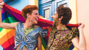 Two people celebrating at pride parade