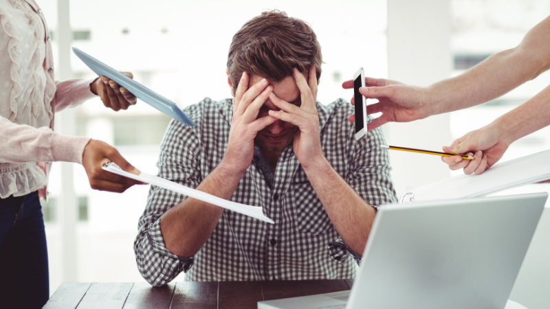 Person looking overwhelmed and stressed