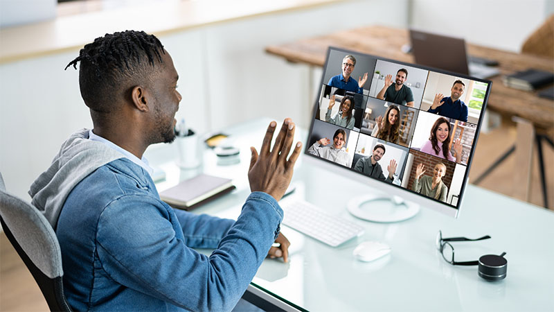 Young person on a video call with a number of participants